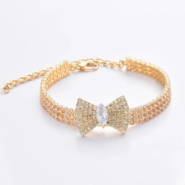 Colar Ajustável de Luxo para Pets com Pingente de Osso e Diamante Zircão em Metal Cobre