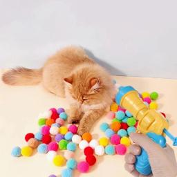 Plush Toy Gun Plush Launcher para Gato, Ferramenta interativa silenciosa, Mini Jogos de Tiro, Brinquedos Stretch Ball, Pet Shop, 1 Conjunto - Image 2